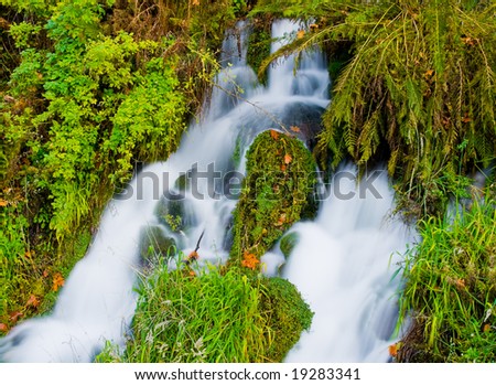 Waterfall in the mountains in autumn