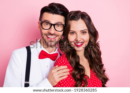 Photo of nice optimistic brown hair couple hug wear trend cloth isolated on pastel pink color background
