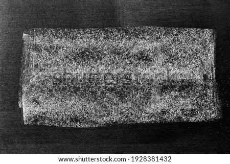 White color chalk hand drawing in line or square shape on black board background