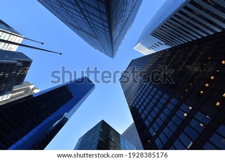 Worm's-eye view architecture and blue background , Lower Manhattan, New York City, USA Royalty-Free Stock Photo #1928385176