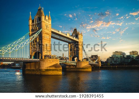 Tower Bridge by river thames  in London, england, UK Royalty-Free Stock Photo #1928391455