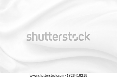 Abstract white fabric texture background.White cloth background abstract with soft waves. Royalty-Free Stock Photo #1928418218