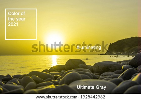 Beautiful blazing sunset landscape at black sea and sky above it as a background. Color of the year 2021