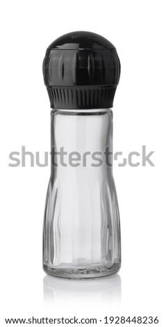 Front view of empty glass pepper mill isolated on white