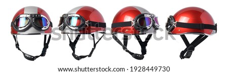 Vintage half motorcycle helmet with glasses, isolated with clipping path on white background. Royalty-Free Stock Photo #1928449730