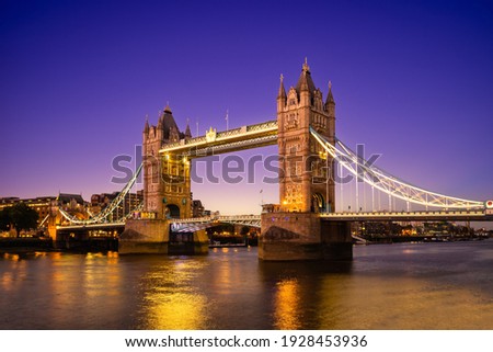 Tower Bridge by river thames  in London, england, UK Royalty-Free Stock Photo #1928453936