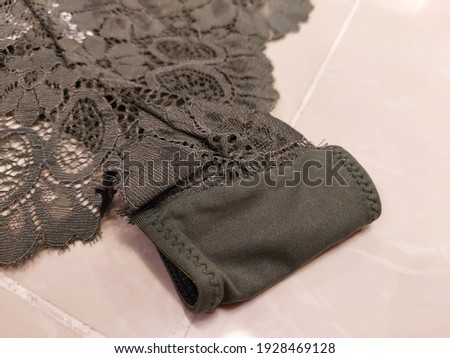 Close-up shot of the green lace and smooth luxury women panty