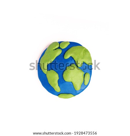 planet earth from plasticine on a white background