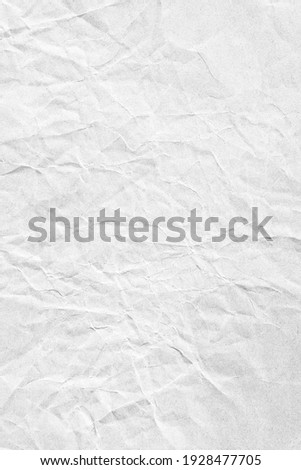 Vertical white crumpled paper surface background texture