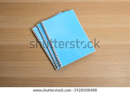 Notebook on the wooden table