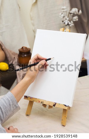 Art class in school, artist student drawing in studio. Painting in classroom. Female hand with pencil. Therapy for teenager, relaxing creative hobby.