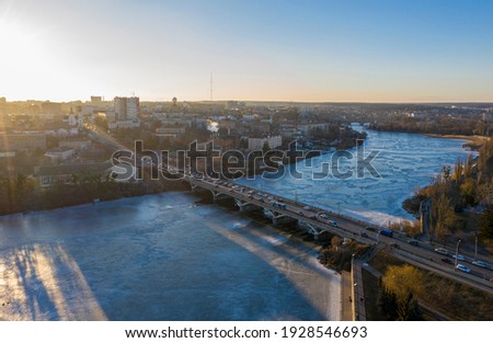 The Vinnytsia city in Ukraine at the winter aerial sunset view.