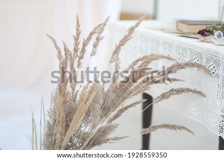 a bouquet of dried flowers in the interior