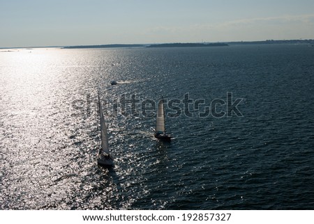team sailing on sea space