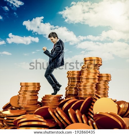business man and gold money coins