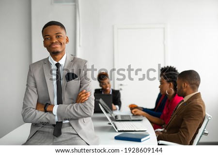 team of young african people in the office  Royalty-Free Stock Photo #1928609144