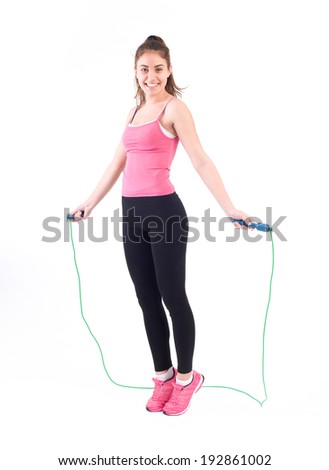 Sport woman exercise with rope. Isolated on a white background. Studio shot 