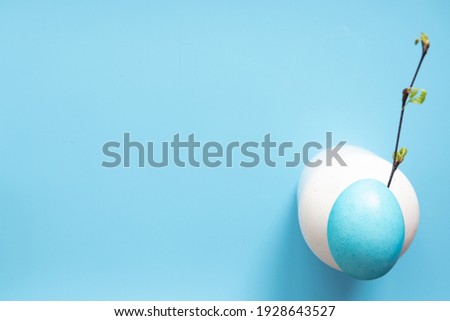 Easter eggs painted in pastel colors on blue. Easter concept