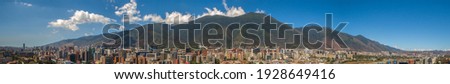 Panoramic photography of Caracas, with the Ávila mountain at the back and beautiful clear skies