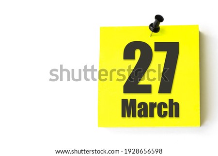 March 27th. Day 27 of month, Calendar date. Yellow sheet of the calendar. Spring month, day of the year concept