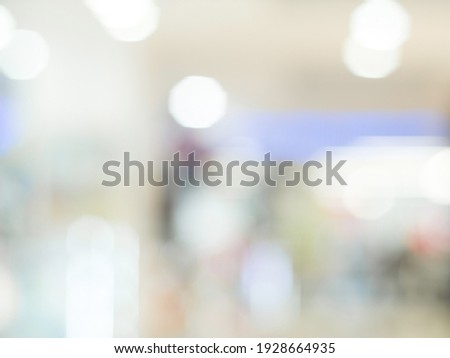 Mall store blurred background with bokeh. Defocused image for design template