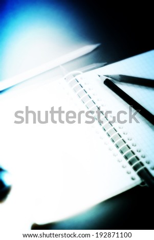 Close-up of pencil and agenda