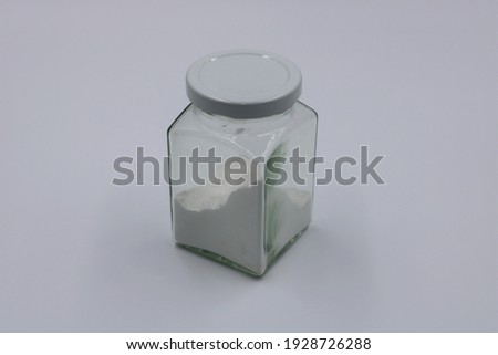 Baking soda in glass jar.