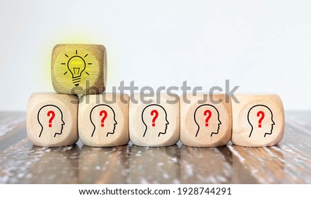 Concept creative idea and innovation. Wooden cube block flip over with head human symbol and light bulb icon Royalty-Free Stock Photo #1928744291