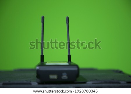 Close up view of wireless microphone receiver in chroma shooting studio  wireless receiver
