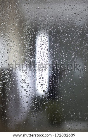 Water drops on a glass wall
