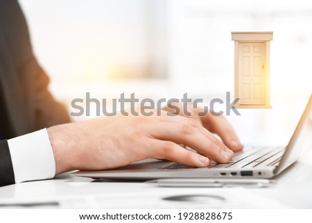 Hands of a young woman on keyboard