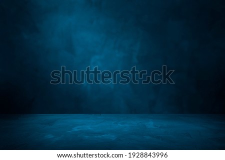 Empty blue concrete floor and blurred wall backgrounds, dark room,  interior, use for product display for presentation and cover banner design.