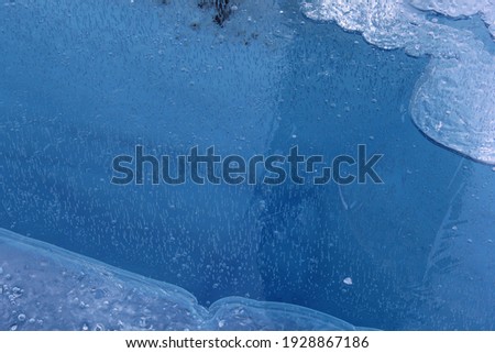 Close up view of a deep blue hole in Perito Moreno Glacier 
