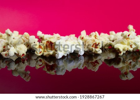 caramel popcorn on a mirror surface