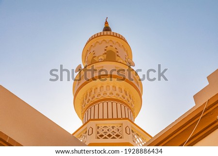 Middle East, Arabian Peninsula, Oman, Ash Sharqiyah North, Bidiya. The minaret of a mosque in the desert of Oman. Royalty-Free Stock Photo #1928886434
