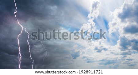 Thunderstorm and blue cloudy sky. Metaphor - a variety of conditions. Changing conditions. Actions in different circumstances. Royalty-Free Stock Photo #1928911721