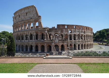 Ancient Roman amphitheater and gladiator arena Colosseum aerial view, heart of Roman Empire, famous tourist landmark, guided tour concept, Rome, Italy Royalty-Free Stock Photo #1928972846