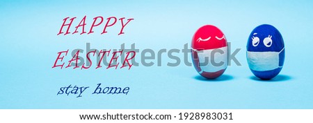 Easter eggs in protective masks on a blue background - the holiday during the coronavirus epidemic and quarantine. Banner with the inscription Happy Easter stay home.