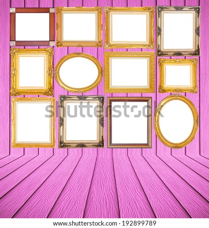 Set of golden vintage frame on wooden background