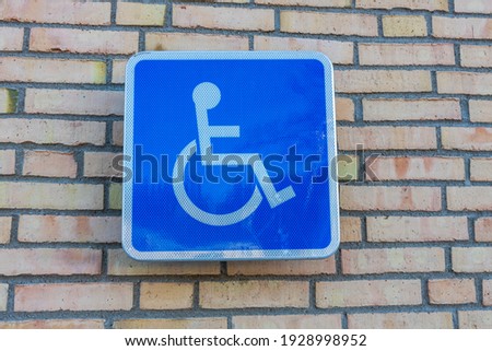 Close up view of sign for parking place for cars with handicapped disabled drivers. Sweden. 
