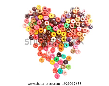colorful of beads in heart shape isolated on white background.