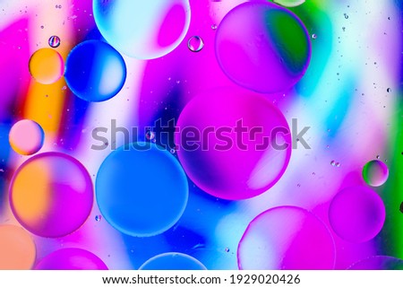image of colorful artistic image of oil drop on water for modern and creation design background.