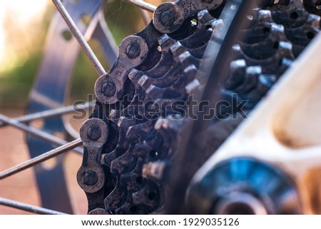 Mountain bike used and dirty gear cassette cogs macro close up shot outside