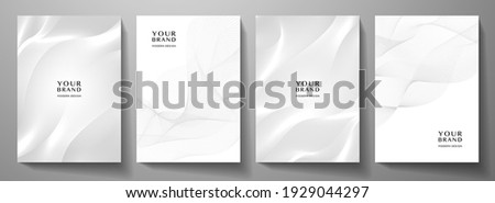 Modern cover design set. Gold abstract line pattern in monochrome colors. Premium white wavy stripe vector template for business page background, certificate, brochure, notebook Royalty-Free Stock Photo #1929044297