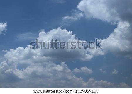 Beautiful cumulus clouds with blue skies background 