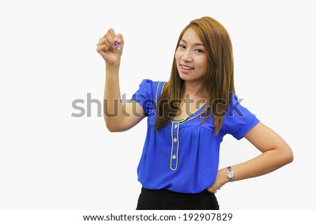 Asian businesswoman with pen writing on the screen. Caucasian model isolated on seamless white background.