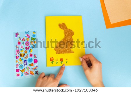 Easter rabbit. greeting card. DIY holiday handicraft decorations. Concept: children's crafts for Easter. Instructions on steps.