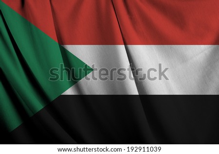 Realistic wavy flag of Sudan. 