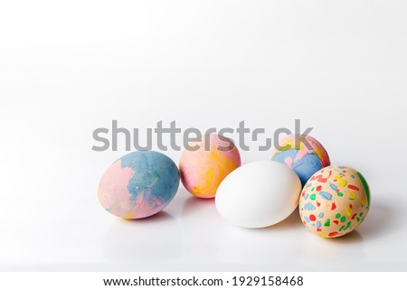 Happy easter, Easter painted eggs on white background for your decoration in holiday, copy space.