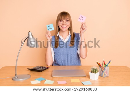 Photo portrait of woman showing nice smiling stickers wearing blue vest glasses isolated on pastel beige color background